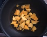 A picture of step 4 of Indonesian-style Coconut Black Rice Pudding with Mango - vegan.