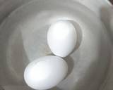 Boil egg and French toast. Breakfast recipe step 1 photo