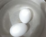A picture of step 1 of Boil egg and French toast. Breakfast.