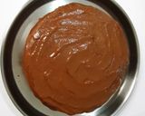 A picture of step 3 of Chocolate biscuit cake.