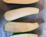 Une image de l'étape 2 de Courgettes farcies au quinoa, parmesan et pignons.