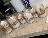 A picture of step 2 of Blueberry, Pomegranate, Peanut Butter & Plum Jam Overnight Oats.
