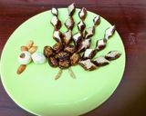 A picture of step 5 of Dryfruits sweet in Peacock pattern.