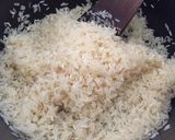 A picture of step 3 of Garlic butter rice with raisins.