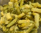 A picture of step 2 of Crispy Aloo Kundri Tawa Fry (Potato and Ivy gourd).