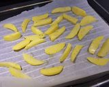 A picture of step 2 of Home made oven chips!!!.