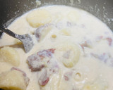 A picture of step 3 of Red Mashed Potatoes.