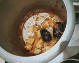 A picture of step 4 of Masala baingan egg plant.