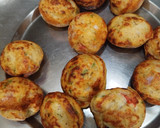 A picture of step 4 of Moong Dal Appe with vegetables.
