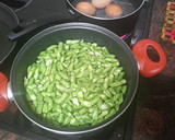Foto del paso 2 de la receta: Habichuelas compuestas con carne de cochino, papas fritas y huevo duro