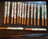 A picture of step 4 of Christmas chocolate covered pretzel rods.