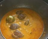A picture of step 4 of Baingan masala (tangy and sweeet taste).