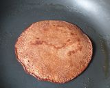 A picture of step 8 of Chocolate pancake with strawberry sauce.