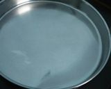 A picture of step 1 of Biscuit cake in a pan.