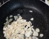 A picture of step 1 of Garlic Bread with fresh basil (no oven bread).