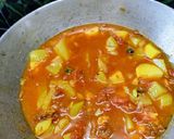 A picture of step 7 of Lau Chingri Curry/Bottlegourd and Prawn curry.