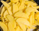 A picture of step 1 of Dragon potatoes with carrots and capsicum.
