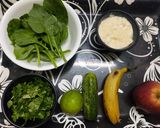 A picture of step 1 of Spinach Cucumber Apple Green Smoothie.