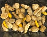 A picture of step 4 of Roasted Jerusalem Artichokes with Thyme & Kumquat.