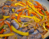 A picture of step 7 of Keto Wors and Sweet Peppers.