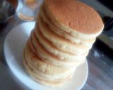 A picture of step 20 of Greek pan cake with honey.