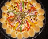 A picture of step 8 of Cheese bomb pizza.