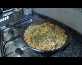 Foto del paso 5 de la receta: Hojas de col rellenas de verduras, pollo y arroz