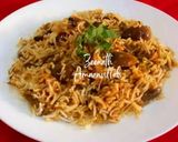 A picture of step 4 of Baingan Pulao.