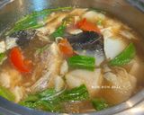 Hình bước làm 5 của món Lẩu Đầu Cá Bớp Măng Chua