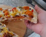 A picture of step 11 of Paneer Tikka pizza.