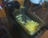 Foto del paso 3 de la receta Muslitos de pollo al ajillo al horno con papas fritas