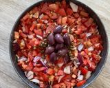 A picture of step 5 of Dakos salad | Cretan salad.