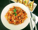 A picture of step 25 of Pasta In Arabiata Sauce With Cheese Chilli Toast.