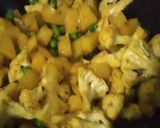 A picture of step 2 of Cauliflower with potatoes and peas.