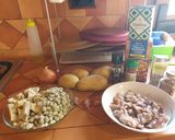 Foto del paso 1 de la receta Guiso de patatas con calamar, alcachofas y habitas tiernas