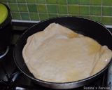 A picture of step 11 of ِDough fried pizza.