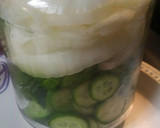 A picture of step 3 of Refrigerator Pickled Cucumber and onion.