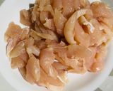A picture of step 1 of Stir fried chicken with garlic shoots 川味蒜苔炒肉.
