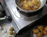 A picture of step 8 of Aloo bada.