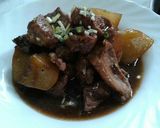 A picture of step 5 of Pork and Potatoes in Soy Sauce (Adobo).
