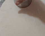 A picture of step 5 of Homemade glazed donuts.