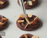 A picture of step 7 of Christmas Wreath Cookies [Chocolate Spritz].