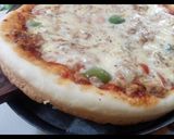 A picture of step 4 of Chicken Tikka Pizza 👅😋.