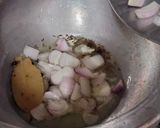 A picture of step 2 of Onion pulao Sindhi Special Bhughal Rice.
