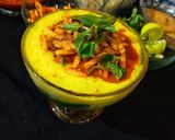 A picture of step 11 of Chicken khausay.