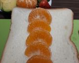 Foto langkah ke 6 dari resep Sandwich Buah Ceria.