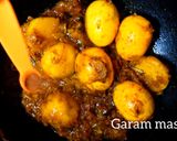 A picture of step 13 of ডিম কষা.