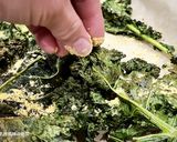 A picture of step 7 of Crispy Kale Chips.