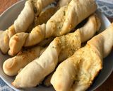 A picture of step 6 of Easy Homemade Cheesy Garlic Butter Twist Breadsticks.