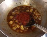 A picture of step 3 of Achari aam sabji.
